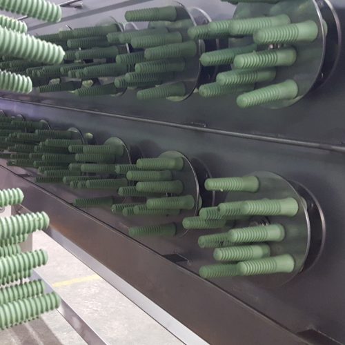 Rotating stainless steel discs hold 10 rubber plucking fingers